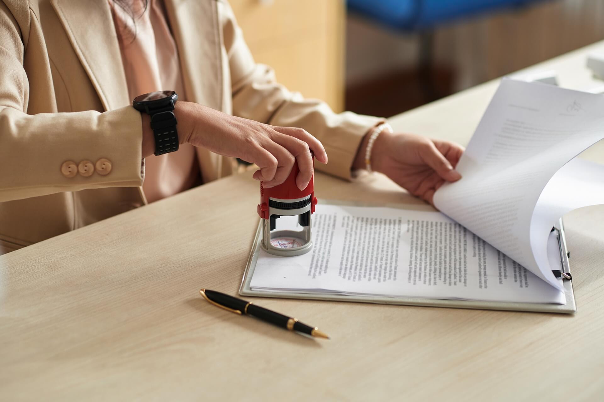 businesswoman applying company seal 2025 01 29 08 10 25 utc
